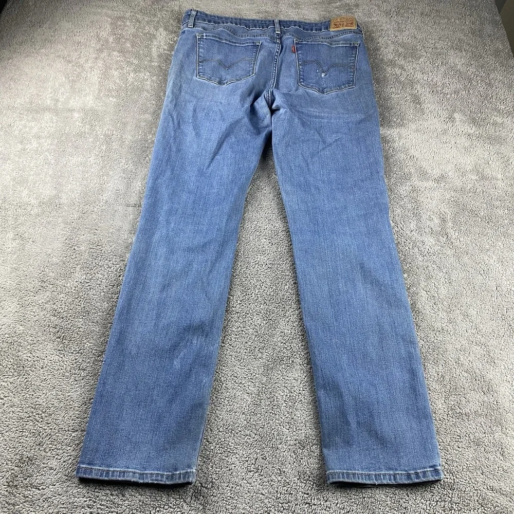 Levis 712 Slim Jeans Womens 32 Blue Medium‎ Wash Mid Rise Distressed